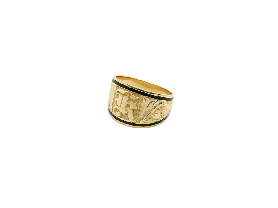 Hawaiian 14K Gold letter with black inlay.