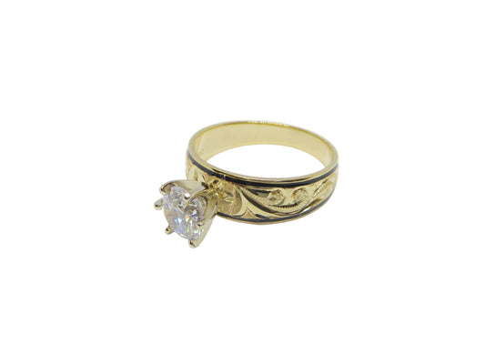 Hawaiian 14K Gold ring with black inlay, polished design and fine craftsmanship.