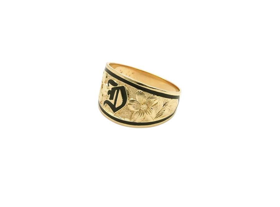 Hawaiian 14K Gold ring with black inlay and engraved letter, stylish design.