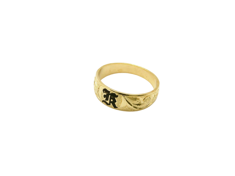 Hawaiian 14K Gold ring with engraved letter, elegant jewelry piece.