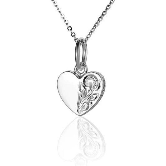 Half and side scroll heart pendant by Ashley's Gift Shop, featuring a delicate heart-shaped design with intricate scroll details.
