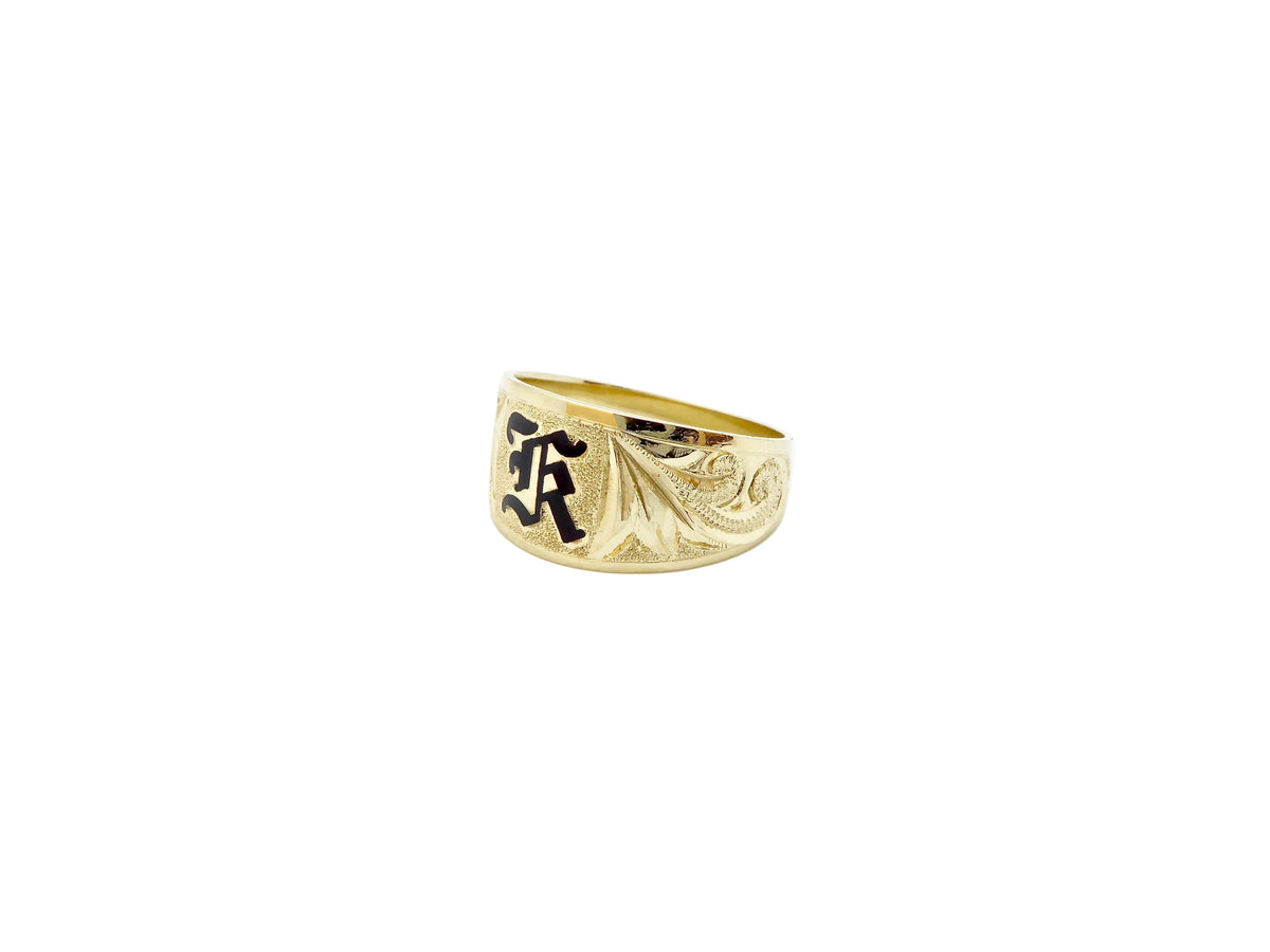 Hawaiian 14K Gold gold ring with intricate design.