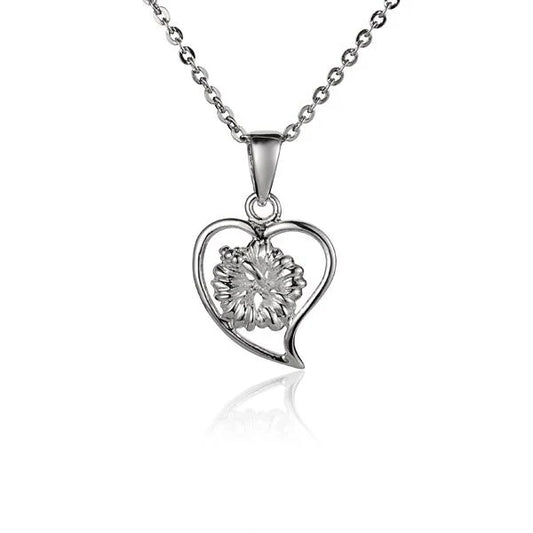 Small Heart Hibiscus Pendant necklace from Ashley's Gift Shop featuring a delicate hibiscus floral design in a heart shape.