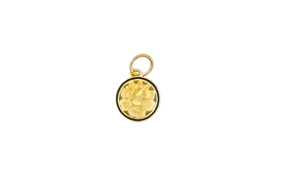 Hawaiian 14K Gold small 14K gold hibiscus cut-out pendant with floral design.