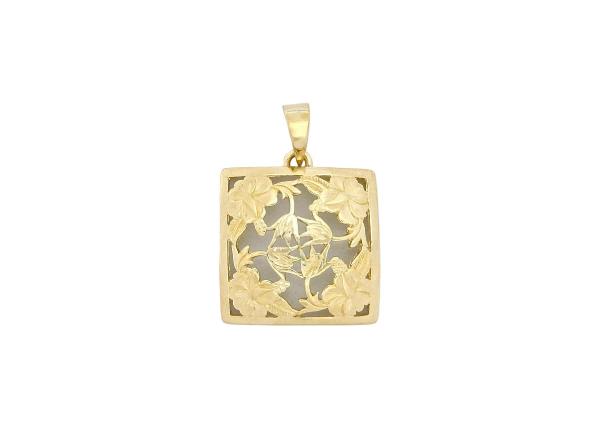 Hawaiian 14K Gold large 14K gold hibiscus quilt pendant with detailed floral design.