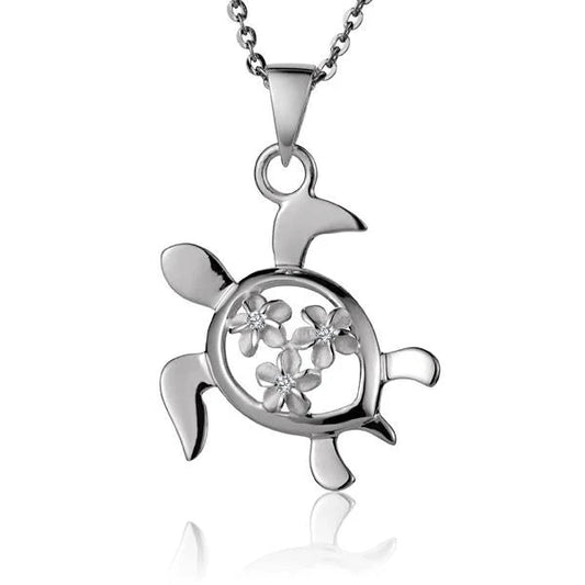 Sterling silver Honu 3 Plumeria CZ pendant featuring a turtle design, showcasing detailed craftsmanship and vibrant gemstone accents.
