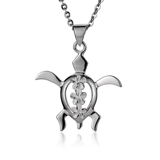 Honu 3 Plumeria pendant by Ashley's Gift Shop featuring a carved turtle with plumeria flower accents on a silver chain