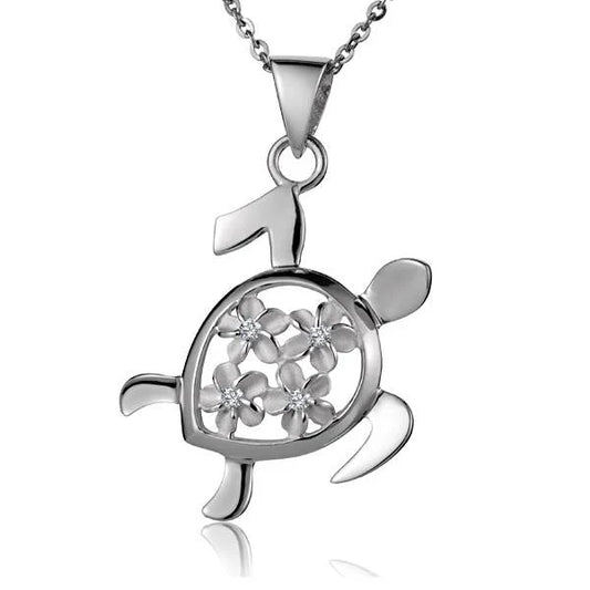 Sterling silver Honu pendant with four plumeria flowers inside, crafted by Ashley's Gift Shop.