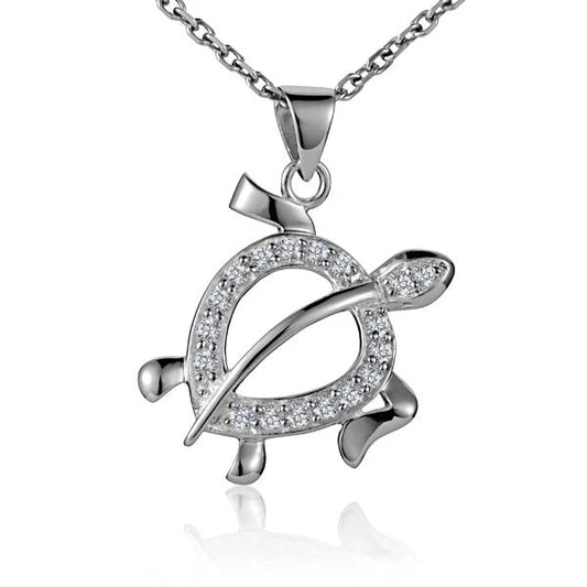 Honu CL CZ pendant featuring a turtle design with cubic zirconia accents, crafted by Ashley's Gift Shop.