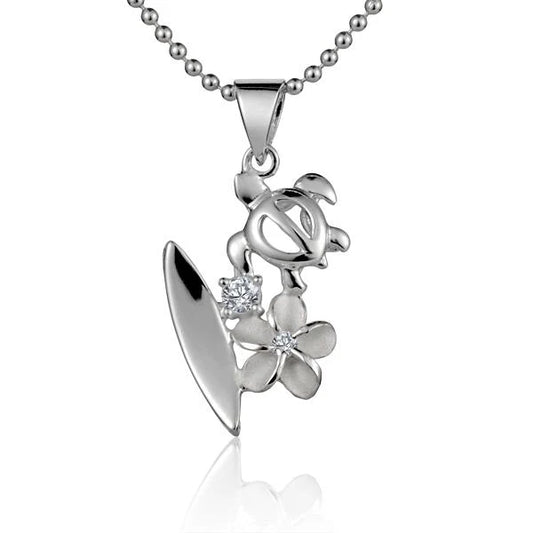 Honu CZ Flower Surfboard Pendant featuring a colorful flower design on a small surfboard-shaped jewelry pendant.