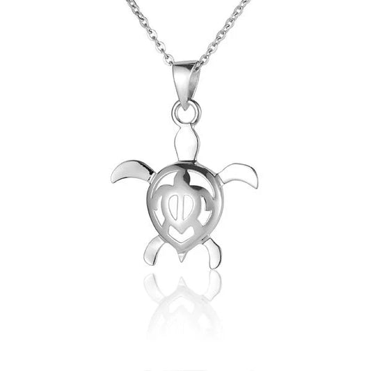 Honu Honu pendant featuring a sea turtle design, crafted by Ashley's Gift Shop, shown hanging on a chain.