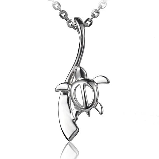 Honu on wire pendant featuring a turtle design, handcrafted jewelry piece by Ashley's Gift Shop with wire wrapping and pendant charm.