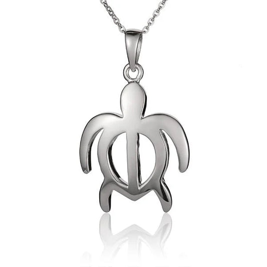 Large Honu pendant featuring a sea turtle design by Ashley's Gift Shop, silver tone with intricate detailing.
