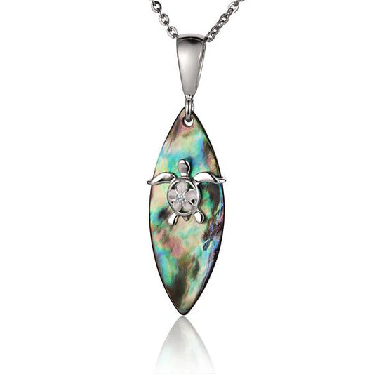 Honu Plumeria Aba surfboard pendant by Ashley's Gift Shop, featuring a detailed surfboard design with plumeria accents.