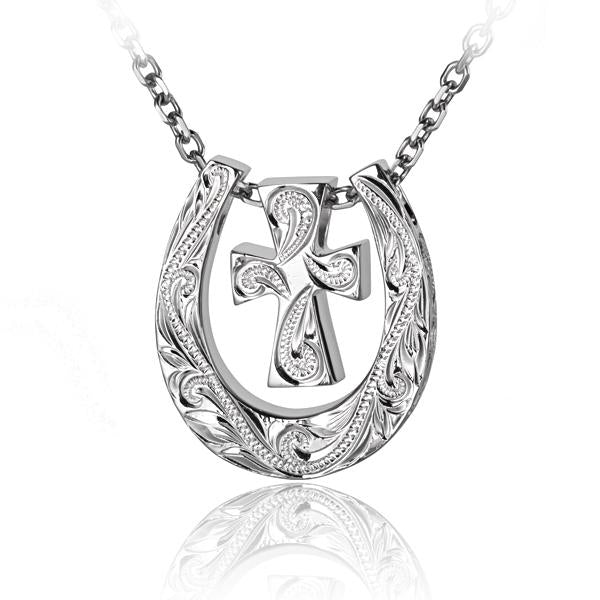Hawaiian 925 Sterling Silver horseshoe and cross scroll pendant with detailed design.