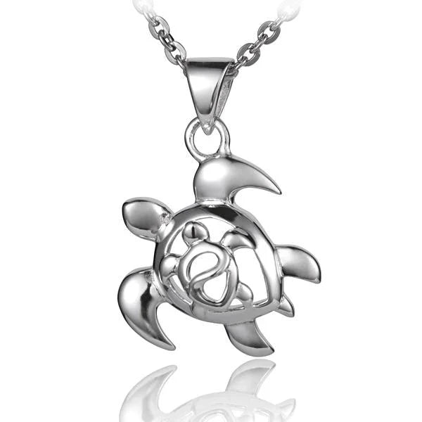 Hawaiian 925 Sterling Silver pendant featuring a left-facing honu turtle with a tiny honu inside.