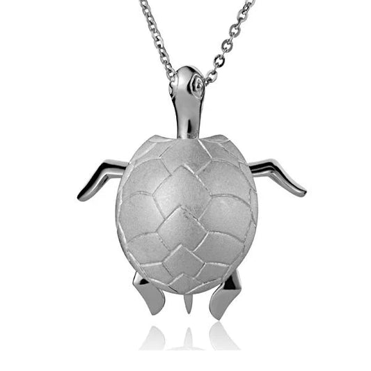 Sterling silver moving turtle pendant with detailed shell and flippers, crafted for elegant jewelry wear.