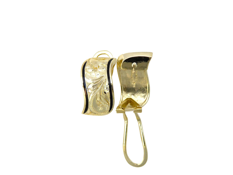 Hawaiian 14K Gold napua clip earring, 10mm size with intricate design, worn on a model's ear.