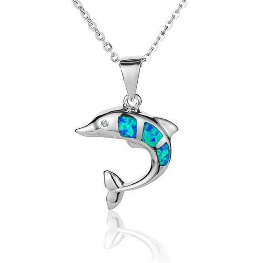 Small opal dolphin pendant from Ashley's Gift Shop, featuring a shimmering blue and white opal dolphin charm.