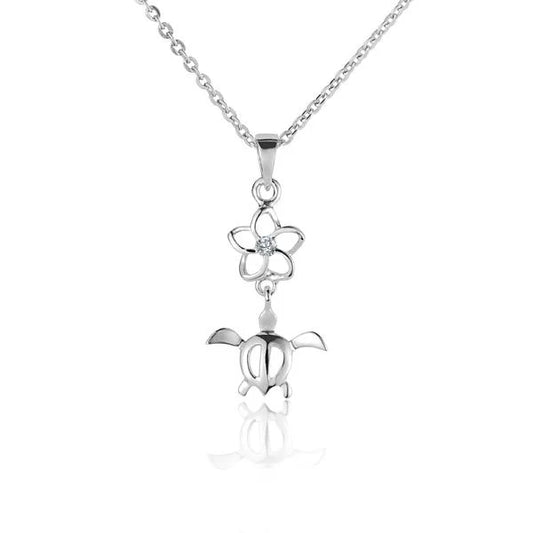 Outline CZ Honu pendant featuring an 8mm turtle design with cubic zirconia accents, crafted by Ashley's Gift Shop.