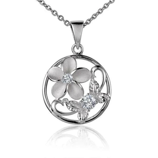 Sterling silver Plumeria 4-Leave CZ round pendant showcasing detailed floral design and sparkling cubic zirconia accents.