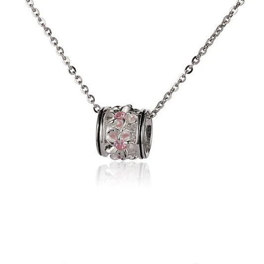 Pink CZ Plumeria Barrel Pendant in medium size, featuring floral design and silver-tone metal, perfect for jewelry accessorizing.