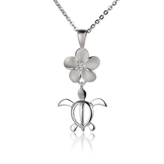 Plumeria CZ and Honu pendant, 12mm, featuring a floral design with ocean turtle motif, crafted by Ashley's Gift Shop.