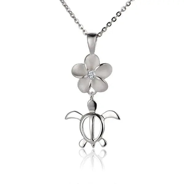 Hawaiian 925 Sterling Silver plumeria CZ and Honu pendant, 12mm size, with intricate floral and turtle design.