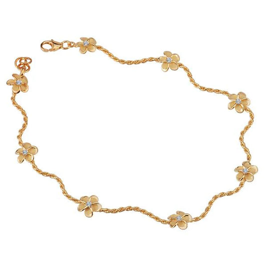 Yellow gold plated Plumeria CZ rope anklet with 8mm beads, featuring floral-inspired design and adjustable chain.