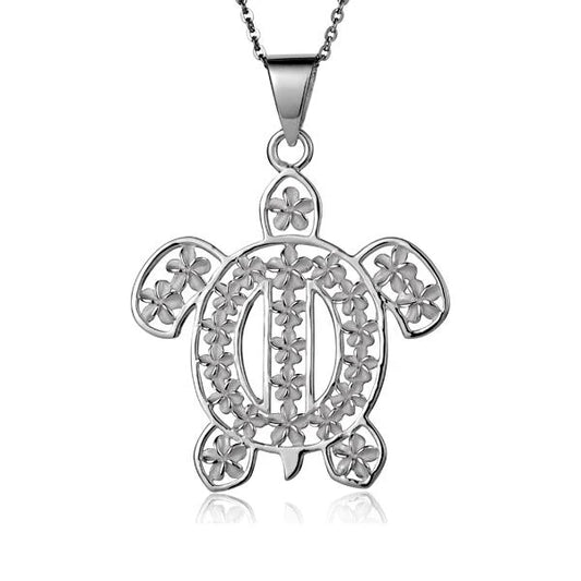 Plumeria Fill in Honu Pendant featuring a turtle design with plumeria flower details, crafted by Ashley's Gift Shop.