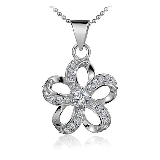 Plumeria outline CZ pendant with sparkling cubic zirconia stones, crafted by Ashley's Gift Shop in a delicate floral design.