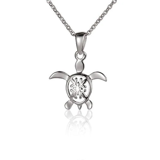 Ashley’s Gift Shop Quilt Honu Pendant featuring a detailed turtle design, perfect for jewelry and accessory collection.