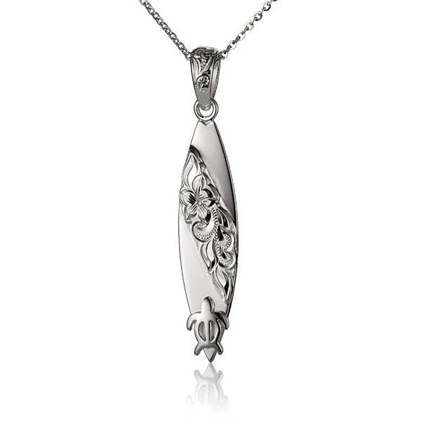 Hawaiian 925 Sterling Silver honu surfboard pendant with raised design.