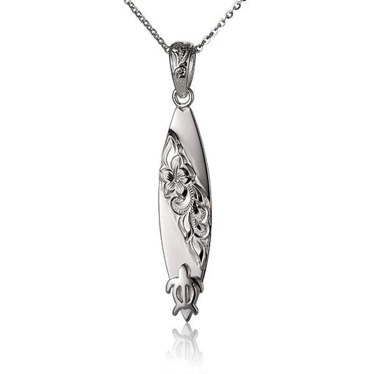 Raised SCR Honu surfboard pendant in silver with detailed turtle design, ideal for jewelry or necklace accents.