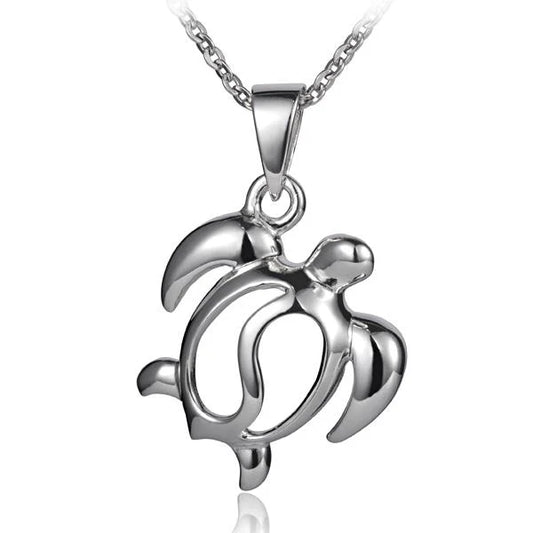 Right Honu pendant featuring a turtle design from Ashley's Gift Shop, shown in a close-up of the silver pendant with intricate details.