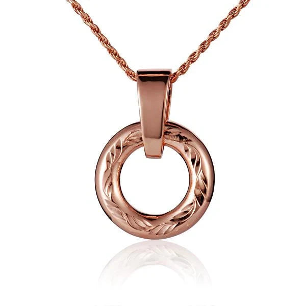 Hawaiian 925 Sterling Silver round engraved pendant made of 925 sterling silver with intricate engraved design.