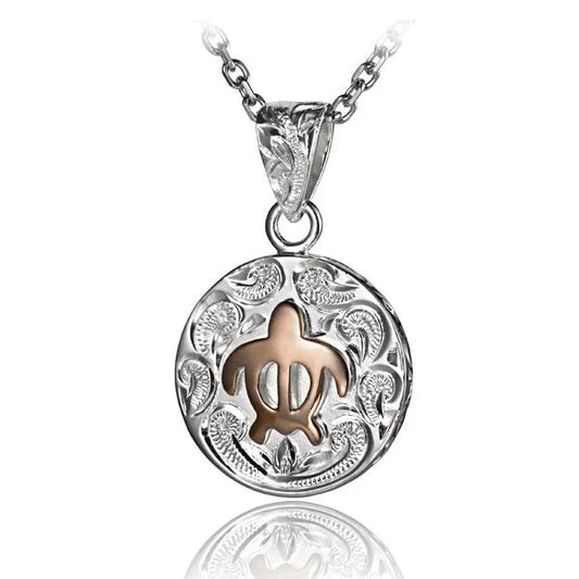 Round Honu Scroll Pendant by Ashley's Gift Shop featuring a circular pendant with a carved turtle design on a silver chain.