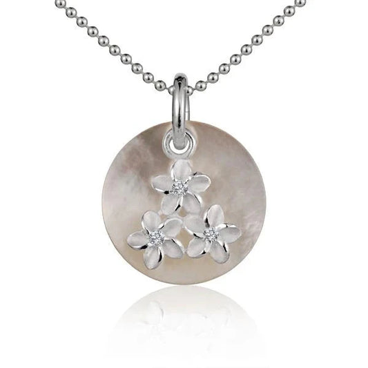 Round Shell 3 Plumeria pendant in 925 sterling silver featuring a floral design, showcasing intricate craftsmanship and natural shell detail.