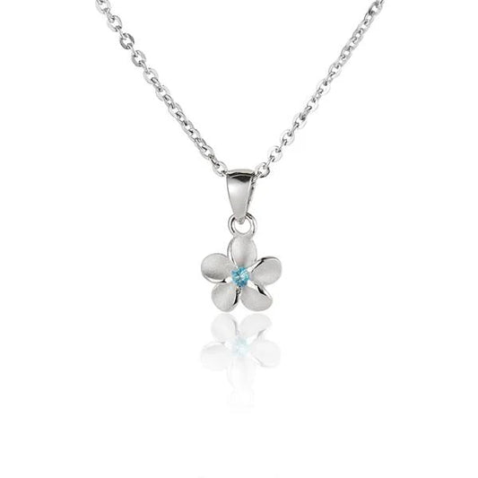 Blue CZ pendant with plumeria design, 8mm size, featuring a textured blasted finish, from Ashley's Gift Shop.