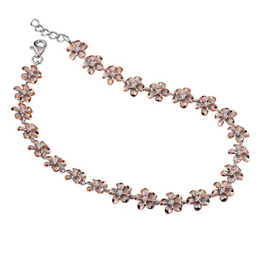 Rhodium-plated Plumeria anklet with 8mm beads from SAK, featuring a delicate floral design and adjustable chain.