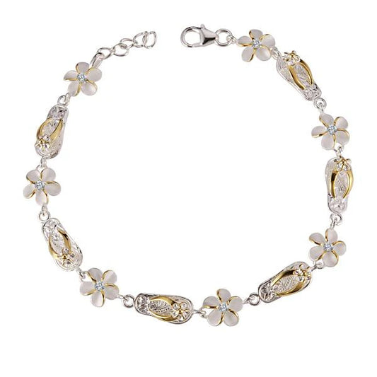 Sterling silver slipper charm bracelet with 8mm plumeria CZ beads, crafted from 925 sterling silver, on a delicate chain.