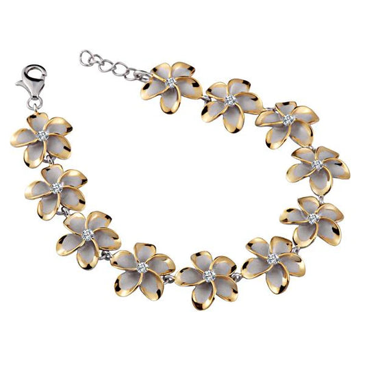 Sterling silver SBR Plumeria CZ bracelet with yellow gold plating, 15mm width, featuring floral design and sparkling cubic zirconia accents.