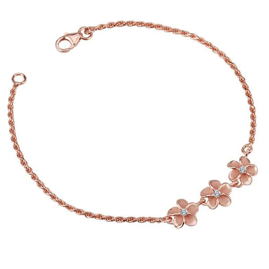 Sterling silver Plumeria CZ rope bracelet with 10mm plumeria charms and PG plating, crafted by Ashley's Gift Shop.