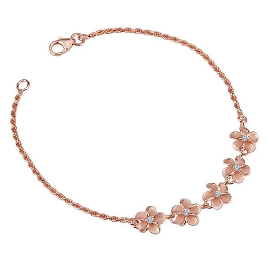 Sterling silver Five Plumeria CZ PG plated rope bracelet with 8mm beads, featuring floral and gemstone accents.