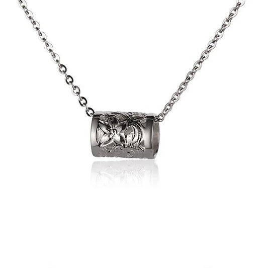 Scroll Barrel Pendant necklace with intricate metal scroll design, crafted by Ashley's Gift Shop.