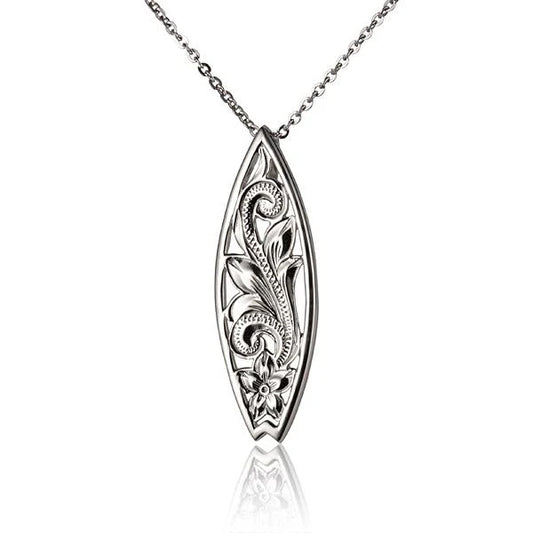 Scroll c/o surfboard pendant by Ashley's Gift Shop featuring a detailed, vintage-style surfboard design on a silver-colored pendant.