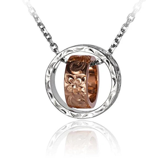 Elegant scroll circle and ring pendant featuring intricate design, crafted by Ashley's Gift Shop for a sophisticated jewelry look.