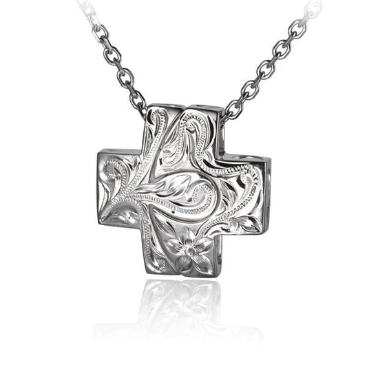 Pair of scroll cross pendants with intricate designs, crafted by Ashley's Gift Shop, displayed against a neutral background.