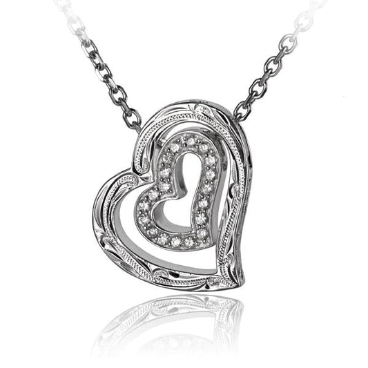 Ashley’s Gift Shop Scroll+ CZ Heart Pendant featuring a silver-tone design with sparkling cubic zirconia accents.