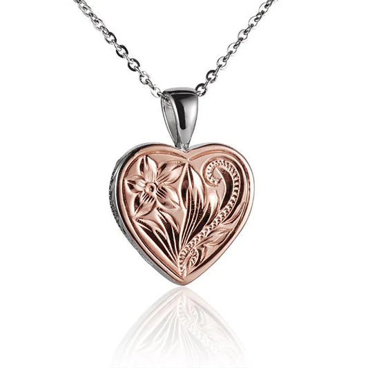 Scroll heart pendant by Ashley's Gift Shop featuring an intricate, vintage-inspired heart-shaped design in silver-tone metal.